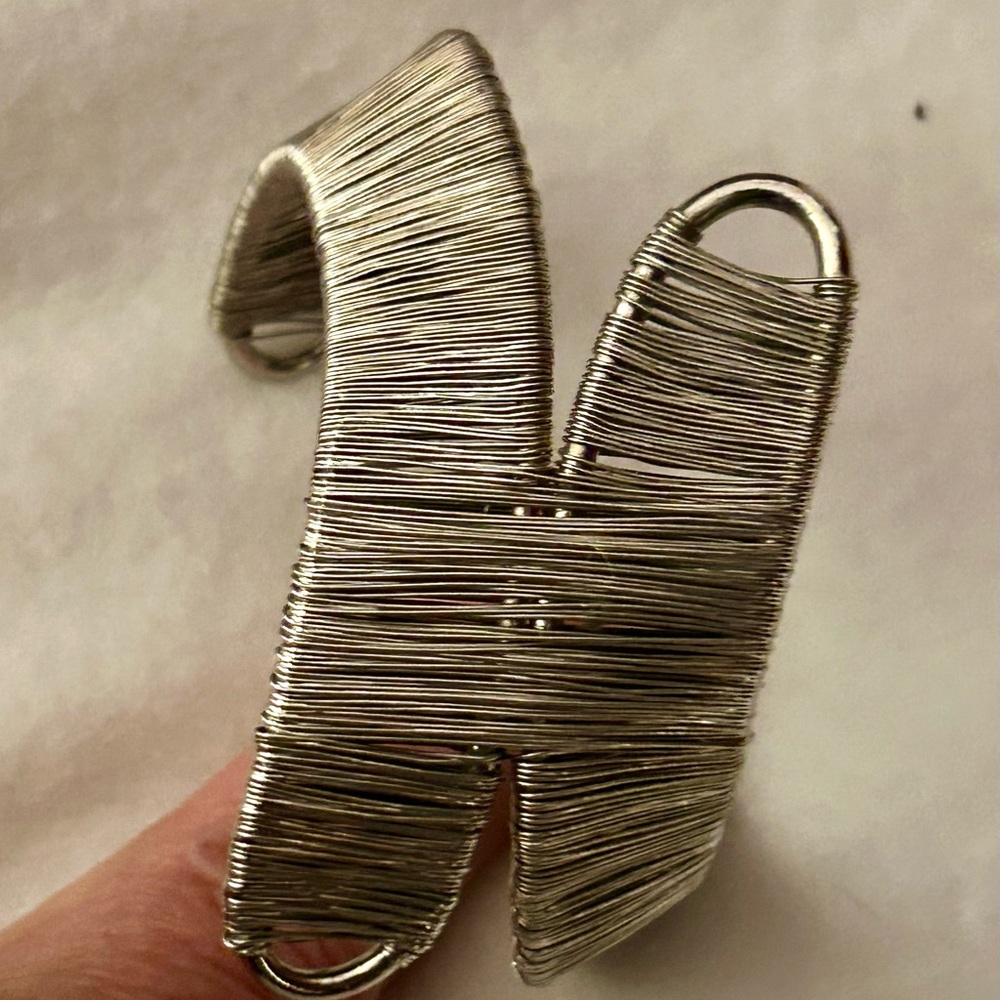 Two silver fashion bracelets black cuff wrap magnetic closure